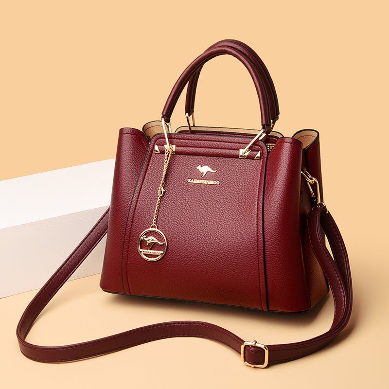 Women's Large-capacity Simple Casual Handbag $81.90 Dana Fashion Color: Wine Red Women's Bags Product information: Lining texture: Polyester Outer bag type: Sandwich pocket Color: wine red, purple, khaki, green, blue Hardness: soft Material: PU Suitcase s