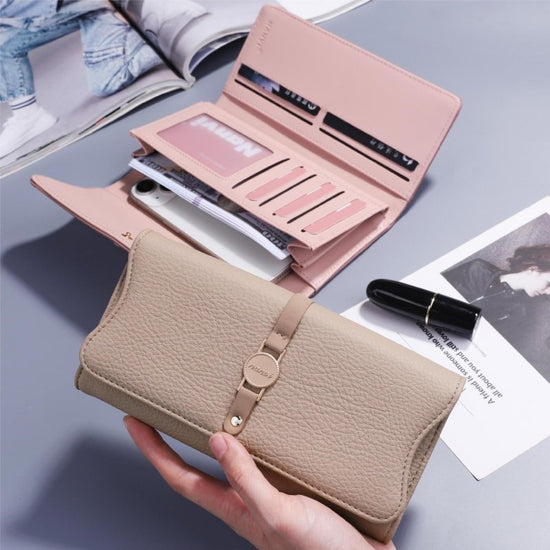 Women's Leather Purse Long And Simple Fashion $32.99 Dana Fashion Color: Apricot Women's Bags Product information: Color: blue, black, apricot, pink, guest Brown, camel Function: anti-theft card swiping Material: pu Popular elements: sewing thread, lock P