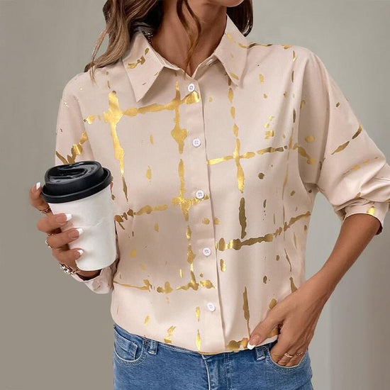 Women's Long-sleeved Lapel Geometric Pattern Bronzing Shirt $49.50 Dana Fashion Color: Khaki Size: L Women's clothing Product information: Pattern: Geometry Color: khaki Size: S,M,L,XL Version: Loose Popular elements: Bronzing Fabric name: Polyester Sleev
