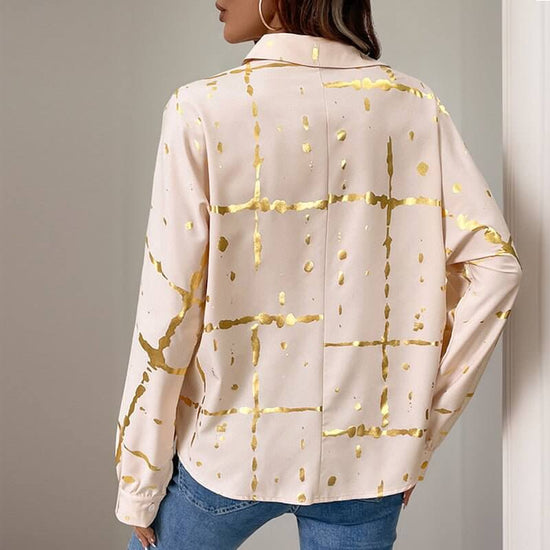 Women's Long-sleeved Lapel Geometric Pattern Bronzing Shirt $49.50 Dana Fashion Color: Khaki Size: L Women's clothing Product information: Pattern: Geometry Color: khaki Size: S,M,L,XL Version: Loose Popular elements: Bronzing Fabric name: Polyester Sleev