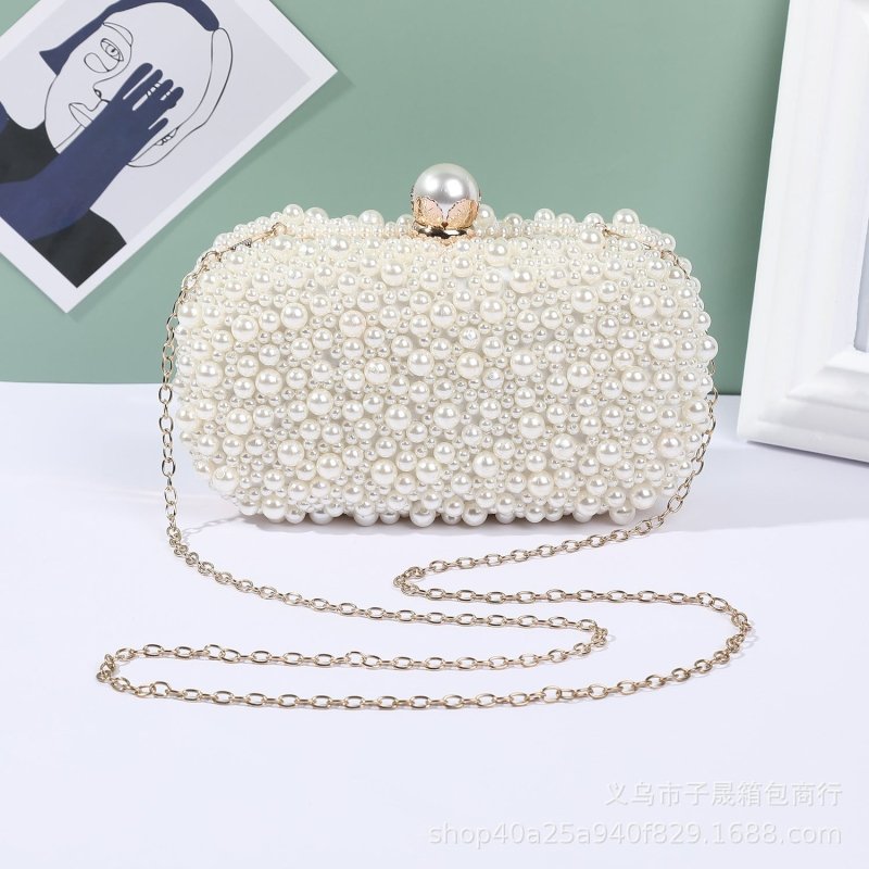 Women's Pearl Dinner Bag Soft Surface Lock Clutch $60.00 Dana Fashion Color: Beige Women's Bags Product information: Fabric texture: Satin Lining texture: Satin Color: white (pearl buckle), Beige Hardness: medium and soft Material: pc abs Suitcase shape: