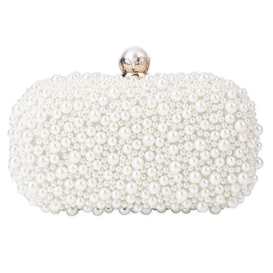 Women's Pearl Dinner Bag Soft Surface Lock Clutch $60.00 Dana Fashion Color: Beige Women's Bags Product information: Fabric texture: Satin Lining texture: Satin Color: white (pearl buckle), Beige Hardness: medium and soft Material: pc abs Suitcase shape: