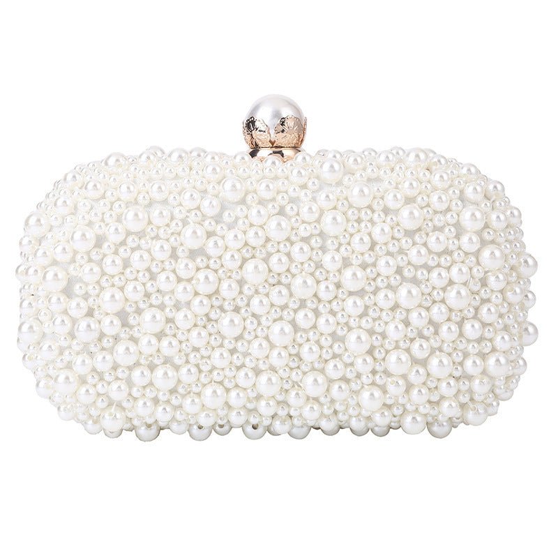 Women's Pearl Dinner Bag Soft Surface Lock Clutch $60.00 Dana Fashion Color: Beige Women's Bags Product information: Fabric texture: Satin Lining texture: Satin Color: white (pearl buckle), Beige Hardness: medium and soft Material: pc abs Suitcase shape: