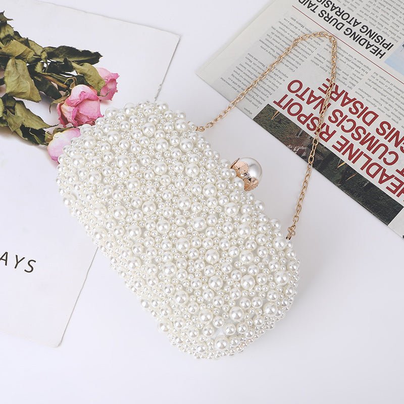 Women's Pearl Dinner Bag Soft Surface Lock Clutch $60.00 Dana Fashion Color: Beige Women's Bags Product information: Fabric texture: Satin Lining texture: Satin Color: white (pearl buckle), Beige Hardness: medium and soft Material: pc abs Suitcase shape: