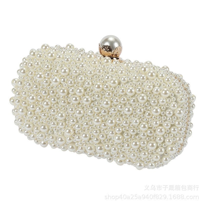 Women's Pearl Dinner Bag Soft Surface Lock Clutch $60.00 Dana Fashion Color: Beige Women's Bags Product information: Fabric texture: Satin Lining texture: Satin Color: white (pearl buckle), Beige Hardness: medium and soft Material: pc abs Suitcase shape: