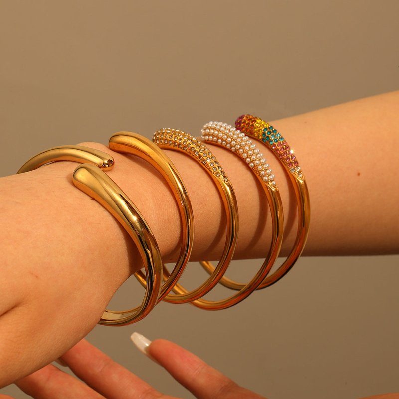 Women's Pearl Titanium Steel Bracelet $27.00 Dana Fashion Color: TB7059 Women's Accessories Product information: Treatment Process: Electroplating Color: TB7059,TB7059-CZ,TB7059-MX,TB7059-PE,TB7158 Material: Stainless steel Popular elements: round, ring P