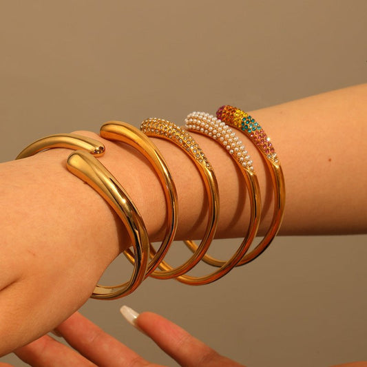 Women's Pearl Titanium Steel Bracelet $27.00 Dana Fashion Color: TB7059 Women's Accessories Product information: Treatment Process: Electroplating Color: TB7059,TB7059-CZ,TB7059-MX,TB7059-PE,TB7158 Material: Stainless steel Popular elements: round, ring P
