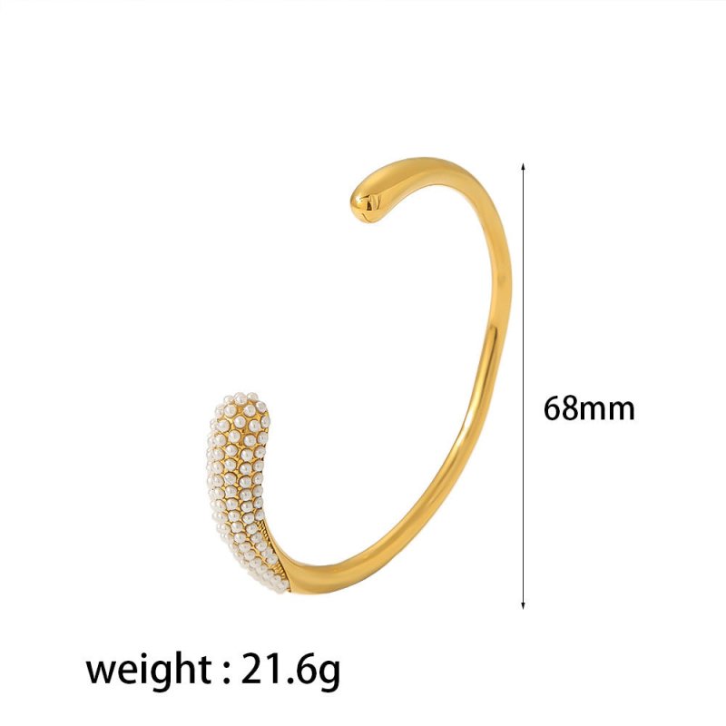 Women's Pearl Titanium Steel Bracelet $27.00 Dana Fashion Color: TB7059PE Women's Accessories Product information: Treatment Process: Electroplating Color: TB7059,TB7059-CZ,TB7059-MX,TB7059-PE,TB7158 Material: Stainless steel Popular elements: round, ring