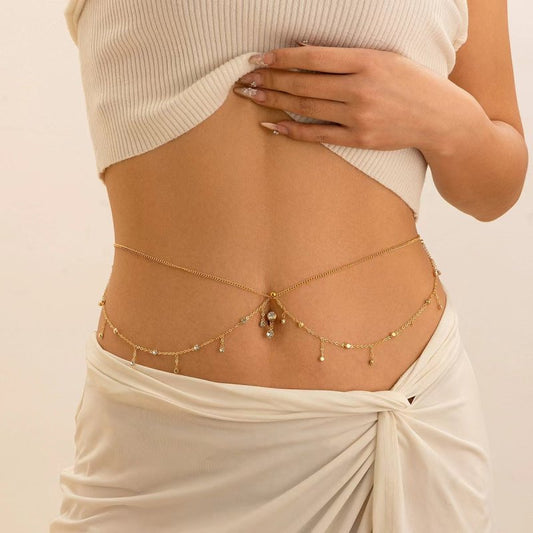 Women's Personalized Zircon Navel Stud Body Chains $14.00 Dana Fashion Color: 01 Gold Women's Accessories Product information: Color: 01 Gold, 02 White k,03 Gold, 04 White k,05 gold Size: 125cm Applicable Gender: Female Material: Metal Popular elements: T