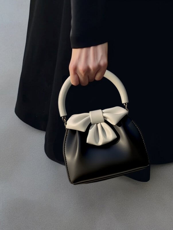 Women's Pleated Handbag Contrast Color Bow Bucket Bag $36.25 Dana Fashion Color: Black Women's Bags Product information: Color: Black Material: PU Size: 20CM * 20CM * 7CM Packing list: 1*Handbag Product Image: