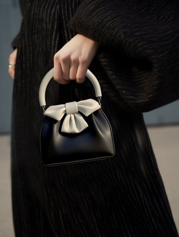 Women's Pleated Handbag Contrast Color Bow Bucket Bag $36.25 Dana Fashion Color: Black Women's Bags Product information: Color: Black Material: PU Size: 20CM * 20CM * 7CM Packing list: 1*Handbag Product Image: