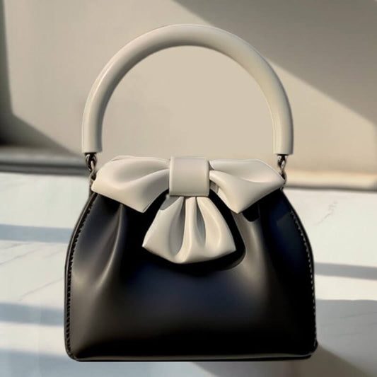 Women's Pleated Handbag Contrast Color Bow Bucket Bag $36.25 Dana Fashion Color: Black Women's Bags Product information: Color: Black Material: PU Size: 20CM * 20CM * 7CM Packing list: 1*Handbag Product Image: