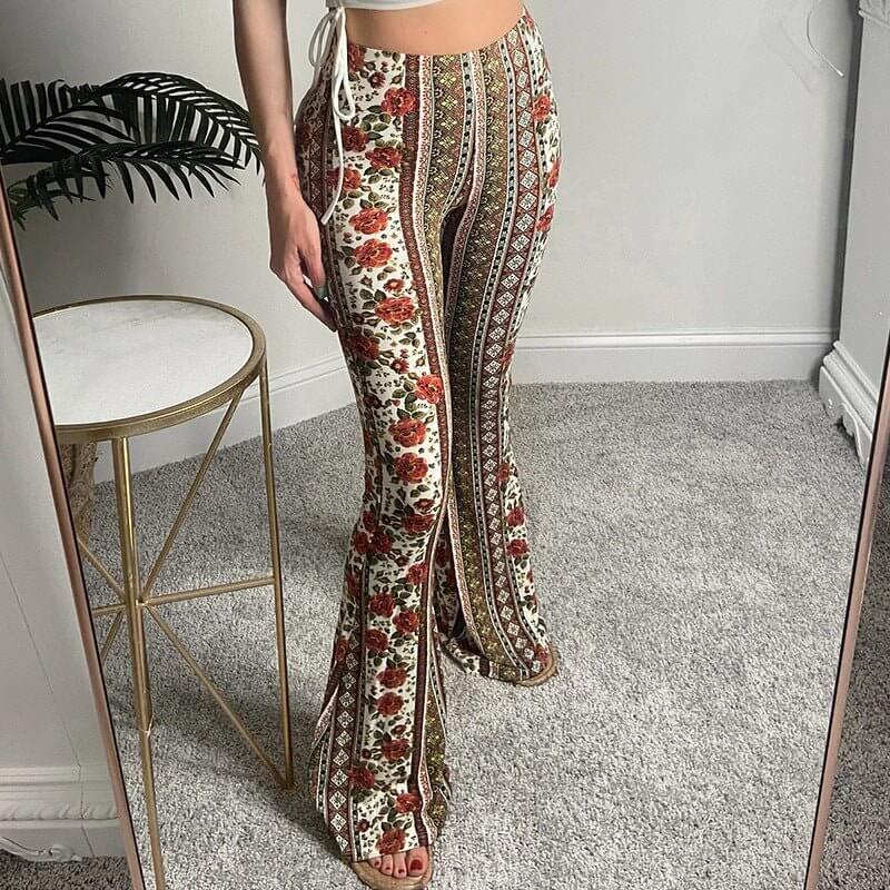 Women's Printed Slightly Flared Leggings $65.90 Dana Fashion Color: Picture Color size: L Women's clothing Product information: Color: yellow, blue, picture color Pants length: trousers Waist type: high waist Size: S,M,L,XL Main fabric composition: Polyes