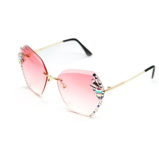 Women's Rhinestone Frameless Sunglasses $30.27 Dana Fashion style: A Women's Bags Product information Brand: LIANGDAN Goods number: 6929 Specification: Adult Glasses structure: frame Whether to polarize: No Lens material: PC Style: exquisite Frame materia