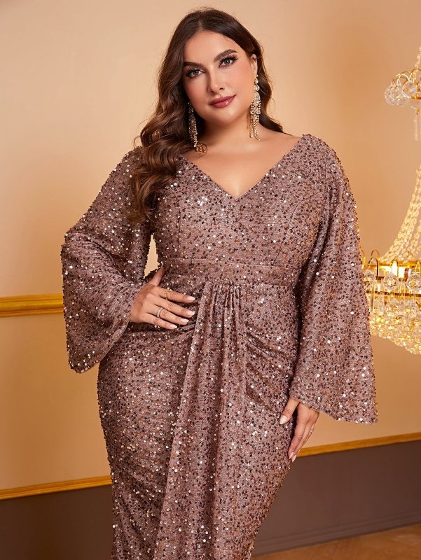 Women's Sequin Long Sleeved V-neck Pleated Dress $94.49 Dana Fashion Color: Camel Size: XL Women's clothing Product information: Fabric name: Polyester Skirt-type: hip skirt Color: Camel Sleeve type: ruffle sleeve Main fabric composition: Polyester (polye