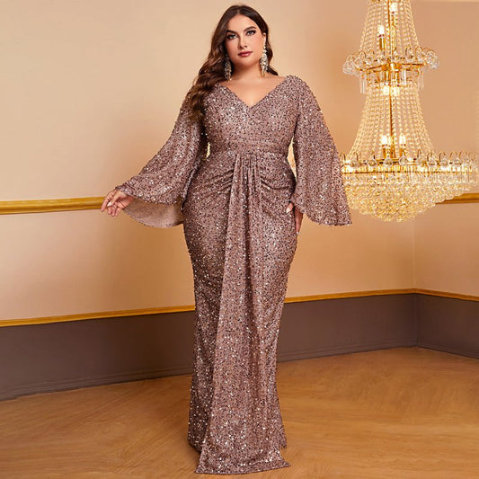 Women's Sequin Long Sleeved V-neck Pleated Dress $94.49 Dana Fashion Color: Camel Size: XL Women's clothing Product information: Fabric name: Polyester Skirt-type: hip skirt Color: Camel Sleeve type: ruffle sleeve Main fabric composition: Polyester (polye