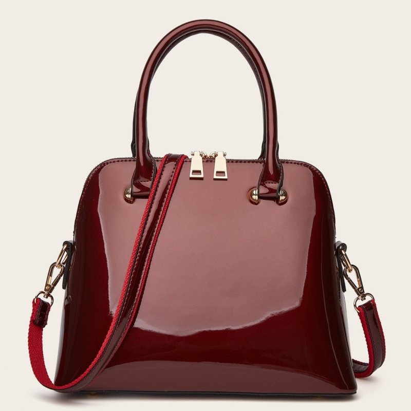 Women's Shiny Tote Shoulder Messenger Bag $48.99 Dana Fashion Color: Black Women's Bags Product information: Lining texture: Polyester Fabric texture: PU Color: wine red, green, blue, black Outer bag type: slit pocket Hardness: medium Material: PU Suitcas