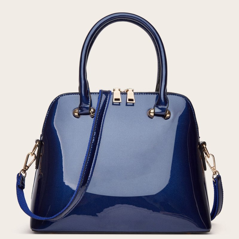 Women's Shiny Tote Shoulder Messenger Bag $48.99 Dana Fashion Color: Black Women's Bags Product information: Lining texture: Polyester Fabric texture: PU Color: wine red, green, blue, black Outer bag type: slit pocket Hardness: medium Material: PU Suitcas