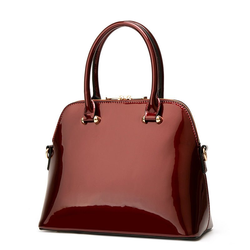 Women's Shiny Tote Shoulder Messenger Bag $48.99 Dana Fashion Color: Black Women's Bags Product information: Lining texture: Polyester Fabric texture: PU Color: wine red, green, blue, black Outer bag type: slit pocket Hardness: medium Material: PU Suitcas