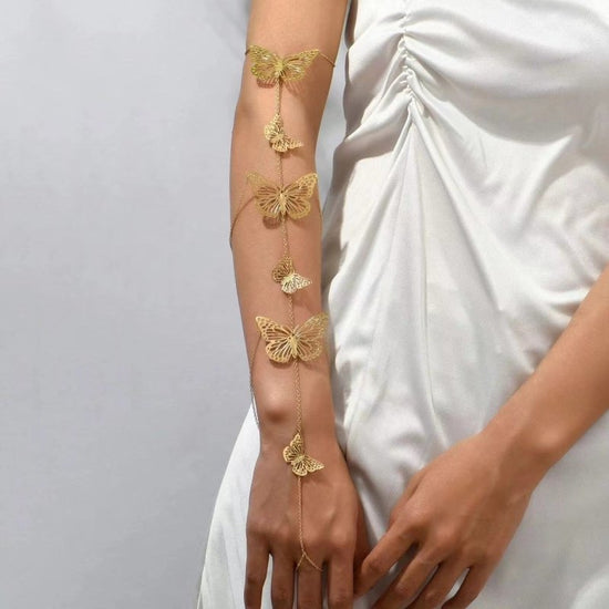 Women's Simple And Adjustable Butterfly Arm Chain $15.00 Dana Fashion Color: Gold Women's Accessories Product information: Treatment Process: Electroplating Color: Gold Style: Women's Material: Alloy Packing list: 1* Arm Chain Product Image: