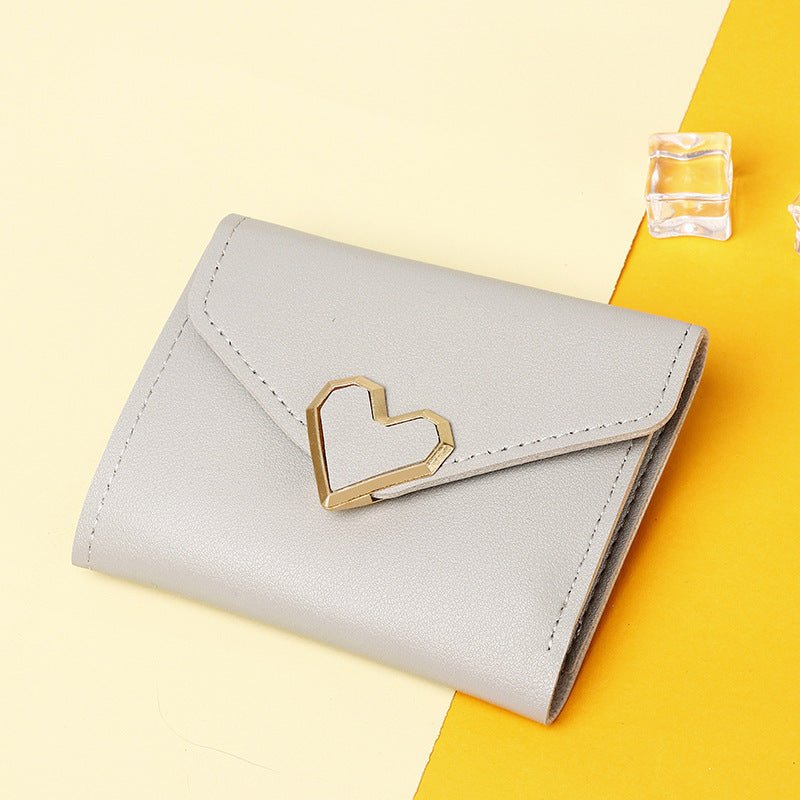 Women's Simple Fashion Personality Mini Wallet $9.55 Dana Fashion Color: Gray Women's Bags Product information: Pattern: solid color Color: black, red, light pink, dark pink, blue, gray, green, purple Material: PU leather Popular elements: sewing line Sty