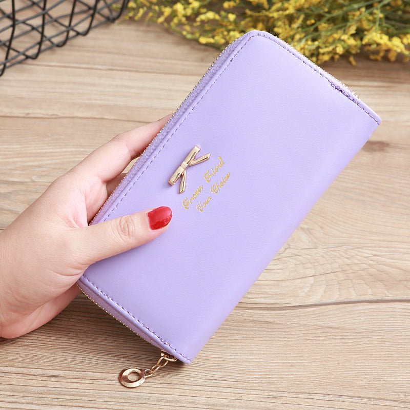 Women's Solid Color Bow Two-layer Wallet $25.00 Dana Fashion Color: Purple Women's Bags Product information: Pattern: solid color Color: white, yellow, red, wine red, purple, green, dark blue, black, pink, watermelon red, Rose Red, Tea Green, sapphire blu