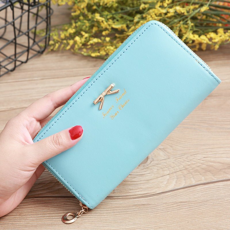 Women's Solid Color Bow Two-layer Wallet $25.00 Dana Fashion Color: Sky Blue Women's Bags Product information: Pattern: solid color Color: white, yellow, red, wine red, purple, green, dark blue, black, pink, watermelon red, Rose Red, Tea Green, sapphire b