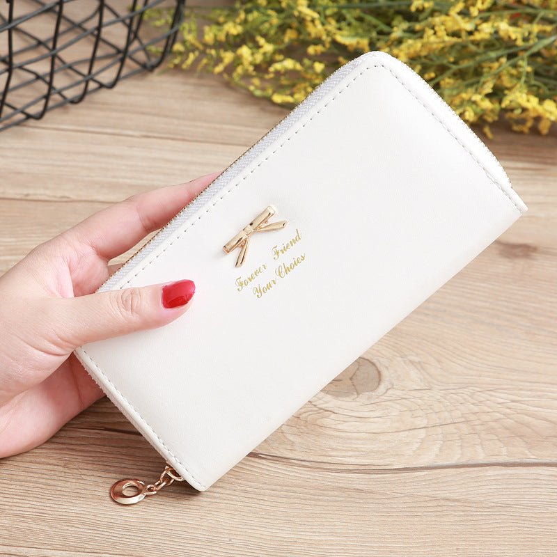 Women's Solid Color Bow Two-layer Wallet $25.00 Dana Fashion Color: White Women's Bags Product information: Pattern: solid color Color: white, yellow, red, wine red, purple, green, dark blue, black, pink, watermelon red, Rose Red, Tea Green, sapphire blue
