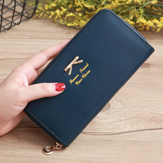 Women's Solid Color Bow Two-layer Wallet $25.00 Dana Fashion Color: Dark Blue Women's Bags Product information: Pattern: solid color Color: white, yellow, red, wine red, purple, green, dark blue, black, pink, watermelon red, Rose Red, Tea Green, sapphire