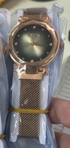 Women's Starry Quartz Lazy Magnet Strap Iron-absorbing Watch $18.50 Dana Fashion Color: L Rose Golden And Black Women's Accessories Product information: Color: L rose gold-Brown, L rose gold Red, L rose gold-black, L rose gold-purple, L rose gold-blue, L