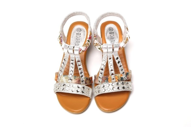 Women's Summer Flat Bottom Rhinestone Elastic Strap Sandals $46.06 Dana Fashion Color: Silver Size: 34 Women's shoes Product information: Lining material: unlined Color: silver, gold Upper height: low top Size: 34, 35, 36, 37, 38, 39, 40 Sole craft: visco