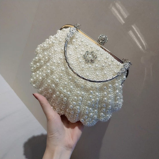 Women's Sweet Lady Pearl Dinner Clutch Bag $73.63 Dana Fashion Color: Yellow Women's Bags Product information: Color: shell white, shell yellow Style: sweet lady Material: Polyester Bag shape: shell shape Opening method: draw belt lock Applicable gender: