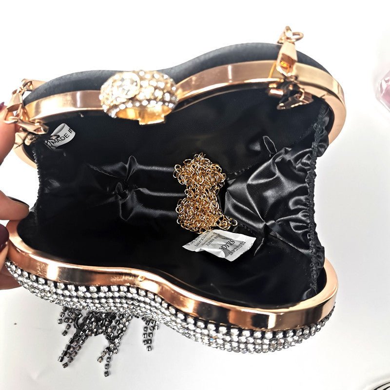 Women's Tassel Inlaid Diamond Handbag $79.00 Dana Fashion Color: Black Women's Bags Product information: Product category: dinner bag Material: metal Applicable scenario: daily collocation Lining texture: polyester Luggage trend style: tassel bag Internal