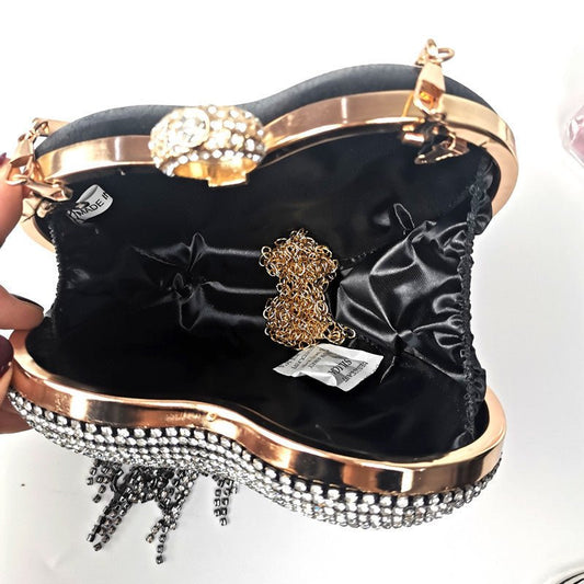 Women's Tassel Inlaid Diamond Handbag $79.00 Dana Fashion Color: Black Women's Bags Product information: Product category: dinner bag Material: metal Applicable scenario: daily collocation Lining texture: polyester Luggage trend style: tassel bag Internal