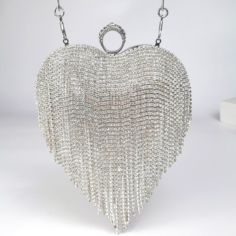 Women's Tassel Inlaid Diamond Handbag $79.00 Dana Fashion Color: Silver Women's Bags Product information: Product category: dinner bag Material: metal Applicable scenario: daily collocation Lining texture: polyester Luggage trend style: tassel bag Interna