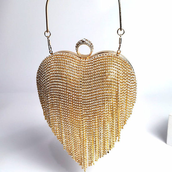 Women's Tassel Inlaid Diamond Handbag $79.00 Dana Fashion Color: Gold Women's Bags Product information: Product category: dinner bag Material: metal Applicable scenario: daily collocation Lining texture: polyester Luggage trend style: tassel bag Internal