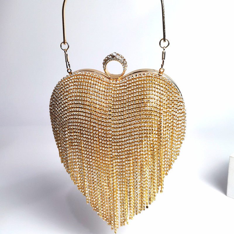 Women's Tassel Inlaid Diamond Handbag $79.00 Dana Fashion Color: Gold Women's Bags Product information: Product category: dinner bag Material: metal Applicable scenario: daily collocation Lining texture: polyester Luggage trend style: tassel bag Internal