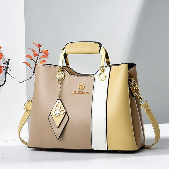 Women's Underarm Elegant One-shoulder Portable Messenger Bag $57.00 Dana Fashion Color: Khaki And Yellow Women's Bags Product information: Lining texture: Polyester Color: white and blue, pink and blue, green and white, black and white, red and blue, khak