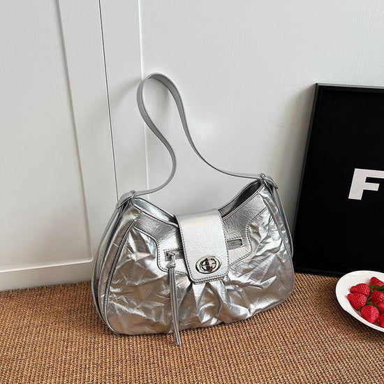 Women's Versatile Crossbody Bag Fashion Shoulder Underarm Bag $66.23 Dana Fashion Color: Silver Women's Bags Product information: Lining texture: polyester cotton Color: black, silver, white Hardness: medium hard Material: PU Suitcase shape: Horizontal Sq