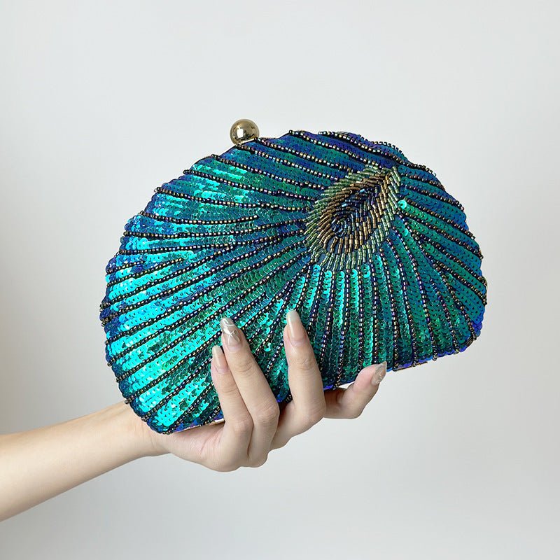 Women's Vintage Beaded One-shoulder Crossbody Chain Handbag $64.21 Dana Fashion Color: Blue Women's Bags Product information: Material: Silk surface Material texture: polyester Internal structure of the bag: mobile phone bag, ID bag Hardness: Hard Outer b