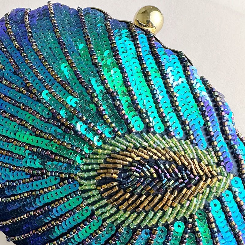 Women's Vintage Beaded One-shoulder Crossbody Chain Handbag $64.21 Dana Fashion Color: Black Women's Bags Product information: Material: Silk surface Material texture: polyester Internal structure of the bag: mobile phone bag, ID bag Hardness: Hard Outer