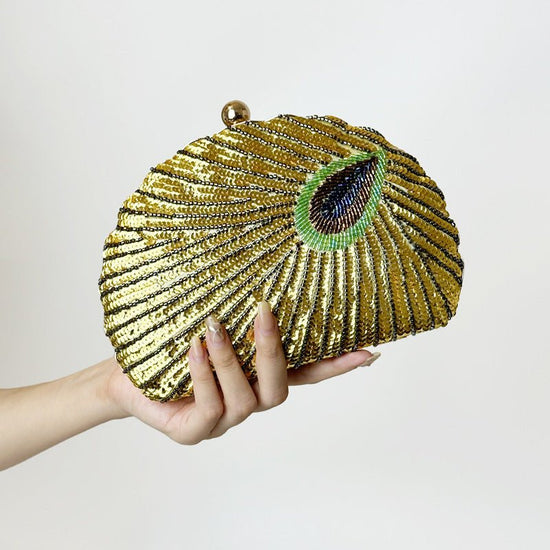 Women's Vintage Beaded One-shoulder Crossbody Chain Handbag $64.21 Dana Fashion Color: Gold Women's Bags Product information: Material: Silk surface Material texture: polyester Internal structure of the bag: mobile phone bag, ID bag Hardness: Hard Outer b
