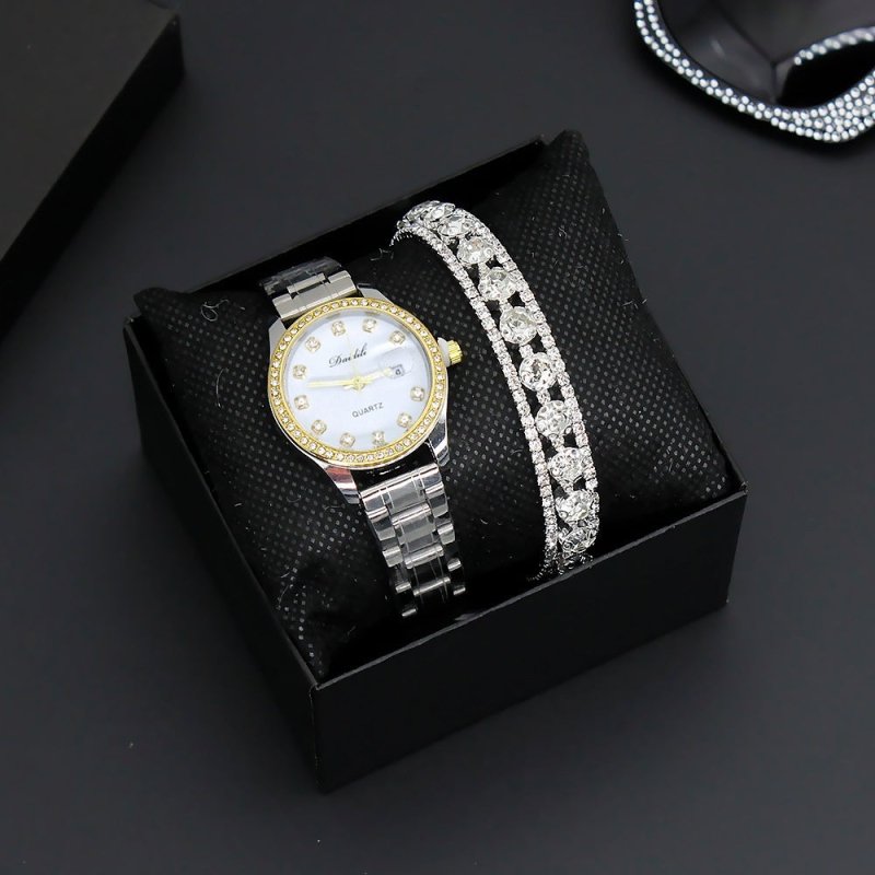 Women's Watch Affordable Luxury Fashion Diamond Foreign Trade Women's Watch Bracelet Student Watch Gift Suit $29.06 Dana Fashion Color: Silver Strap Watch Women's Accessories Product information: Color: gold strap watch three-row drill bracelet box in bla
