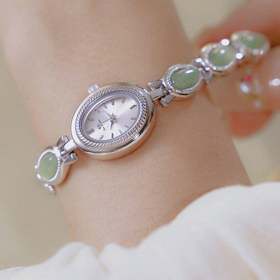 Women's Watch Ladies Bracelet Luxury Brand Waterproof Retro Natural Dongling Stone Hetian Jade Advanced Chain Watches Gift $42.00 Dana Fashion Color: Champagne Noodles Women's Accessories Overview: Unique design, stylish and beautiful. Good material, High