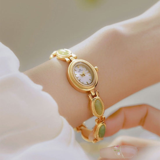 Women's Watch Ladies Bracelet Luxury Brand Waterproof Retro Natural Dongling Stone Hetian Jade Advanced Chain Watches Gift $42.00 Dana Fashion Color: Champagne Noodles Women's Accessories Overview: Unique design, stylish and beautiful. Good material, High
