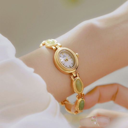 Women's Watch Ladies Bracelet Luxury Brand Waterproof Retro Natural Dongling Stone Hetian Jade Advanced Chain Watches Gift $42.00 Dana Fashion Color: Champagne Noodles Women's Accessories Overview: Unique design, stylish and beautiful. Good material, High