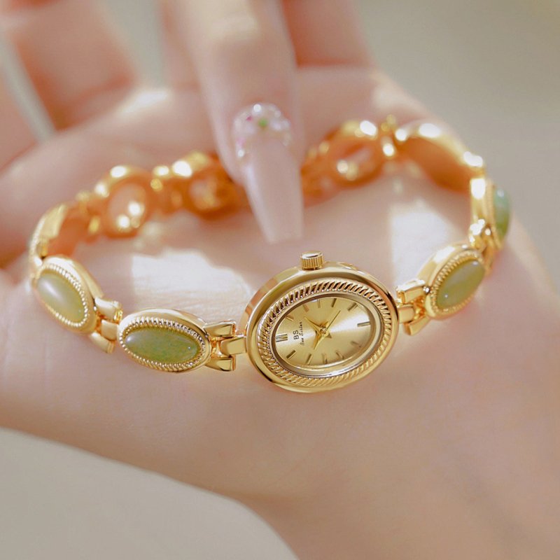 Women's Watch Ladies Bracelet Luxury Brand Waterproof Retro Natural Dongling Stone Hetian Jade Advanced Chain Watches Gift $42.00 Dana Fashion Color: Champagne Noodles Women's Accessories Overview: Unique design, stylish and beautiful. Good material, High