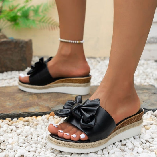 Women's Wedge Bow Slippers $37.50 Dana Fashion Color: Black Size: 36 Women's shoes Product information: Lining material: Leather Toe holder shape: Fish Mouth Color: white, black Shoe Upper material: artificial PU Size: 36,37,38,39,40,41,42 Sole material: