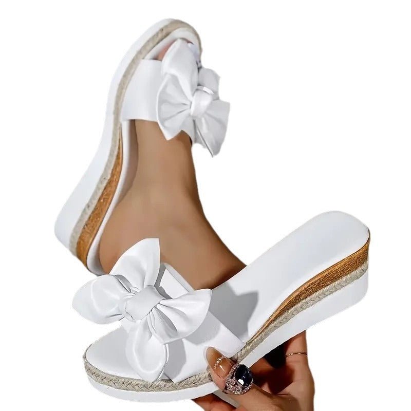 Women's Wedge Bow Slippers $37.50 Dana Fashion Color: Black Size: 36 Women's shoes Product information: Lining material: Leather Toe holder shape: Fish Mouth Color: white, black Shoe Upper material: artificial PU Size: 36,37,38,39,40,41,42 Sole material: