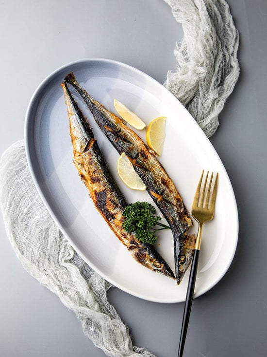 Youci Creative Ceramic Fish Plate Nordic $98.48 Dana Fashion style: 12.5inch fish pan Dana's Kitchen Product information : Material: Porcelain Style: Nordic style Shape: oval Popular elements: Ink style Color classification: Wuhai series-12.5 inch fish pl